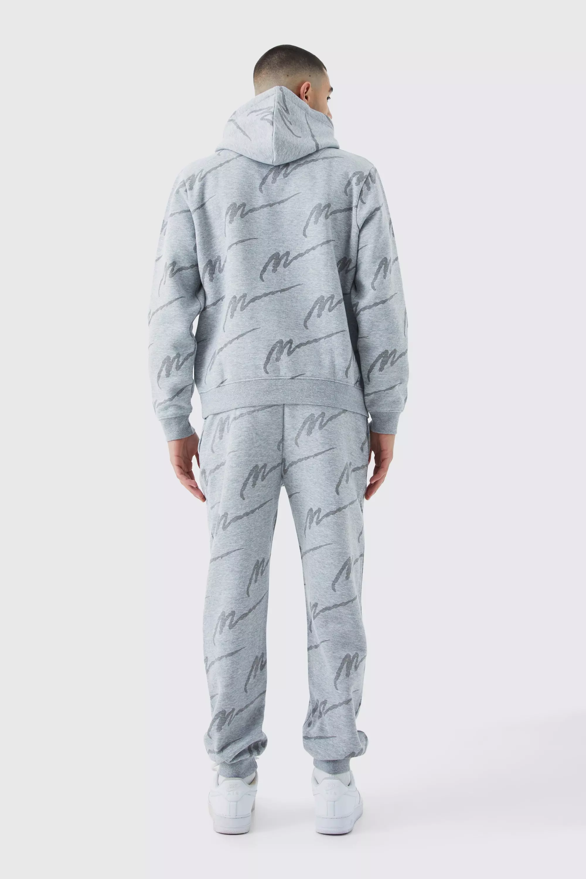 Nike all hotsell over print tracksuit